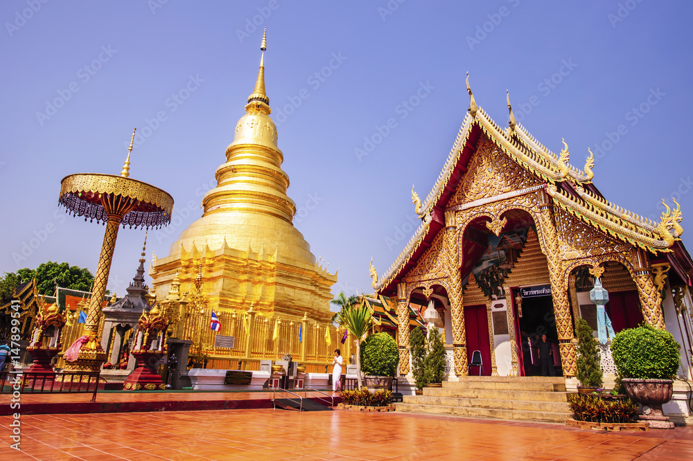 Fototapeta premium LAMPHUN-APRIL,21 :Wat Phra That Hariphunchai pagoda temple important religious traveling destination in northern province is the most famous temple.THAILAND APRIL,21 2017