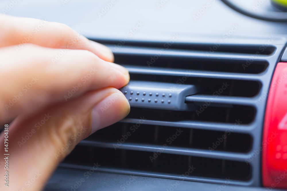 Hand adjust way of car Air flow AC control hole at dashboard. Hand adjust way of car Air flow AC control hole at dashboard.