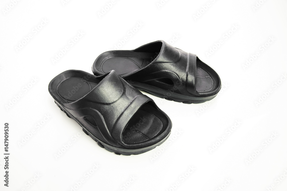 black slippers for men isolated on white background black slippers for men isolated on white background