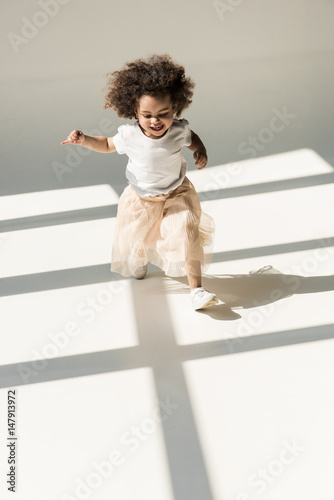 Fototapeta Naklejka Na Ścianę i Meble -  Cute african american baby girl