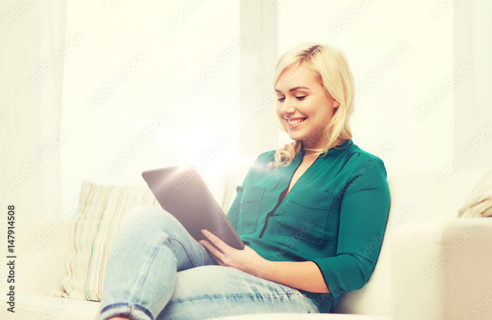 smiling woman with tablet pc at home smiling woman with tablet pc at home