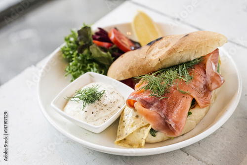 healthy fresh smoked salmon sandwich with egg and sour cream