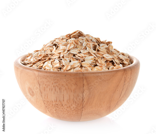 Rolled Oats in bowl wooden on white background