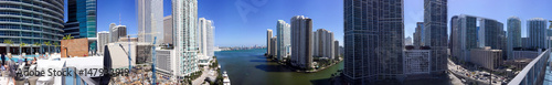 MIAMI, FL - FEBRUARY 2016: Panoramic aerial view of Downtown and Brickell Key. Miami attracts 15 million tourists annually