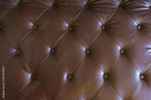 Luxury brown leather sofa texture.