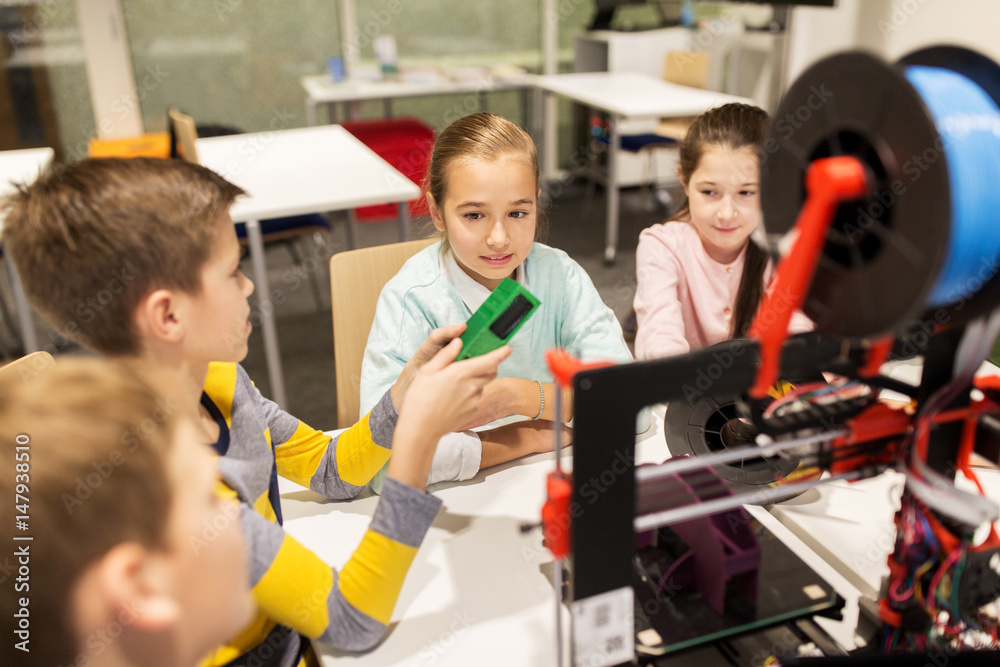 happy children with 3d printer at robotics school happy children with 3d printer at robotics school