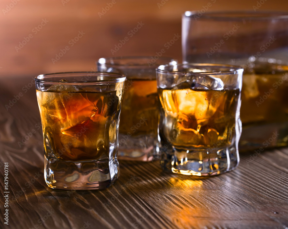 Glasses of whiskey with natural ice Glasses of whiskey with natural ice