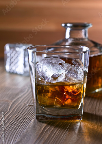 Glasses of whiskey with natural ice