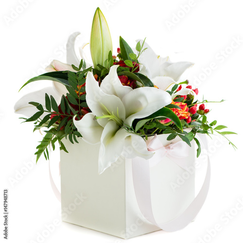 Fototapeta Naklejka Na Ścianę i Meble -  Gift box with fresh lily flowers and chrysanthemum isolated on white background