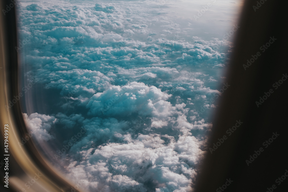 clouds out of airplane window clouds out of airplane window