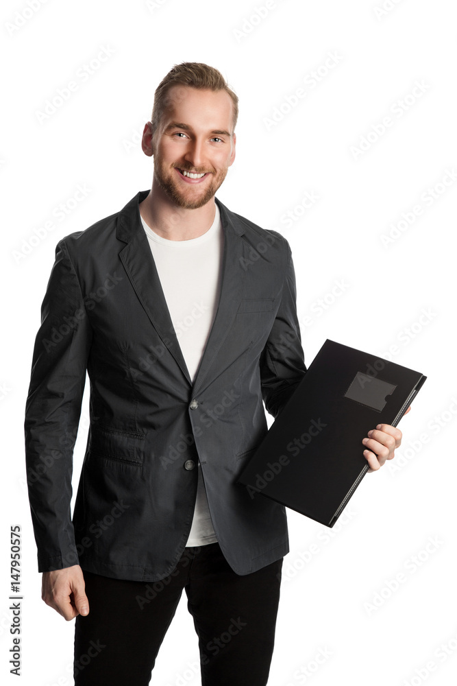 Handsome man in business casual clothing standing holding a clipboard, in front of a white background. Handsome man in business casual clothing standing holding a clipboard, in front of a white background.