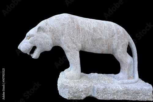 Fototapeta Naklejka Na Ścianę i Meble -  Tiger Statue isolated on black background.