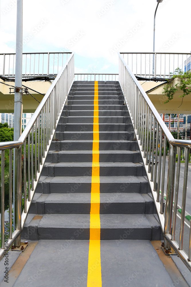 Fototapeta premium Stairs of the overpass in the city.