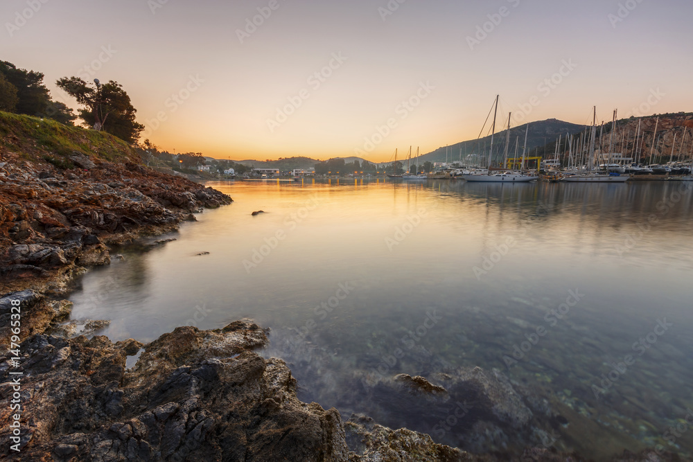 View of a marina in Lakki village on Leros island in Greece early in the morning. 

