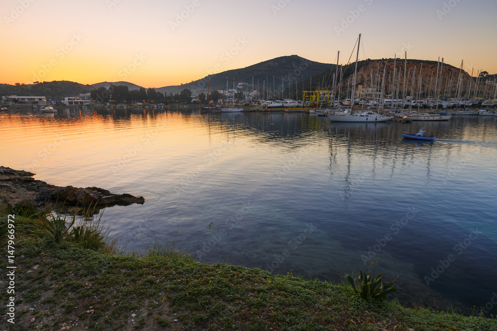 View of a marina in Lakki village on Leros island in Greece early in the morning. 
