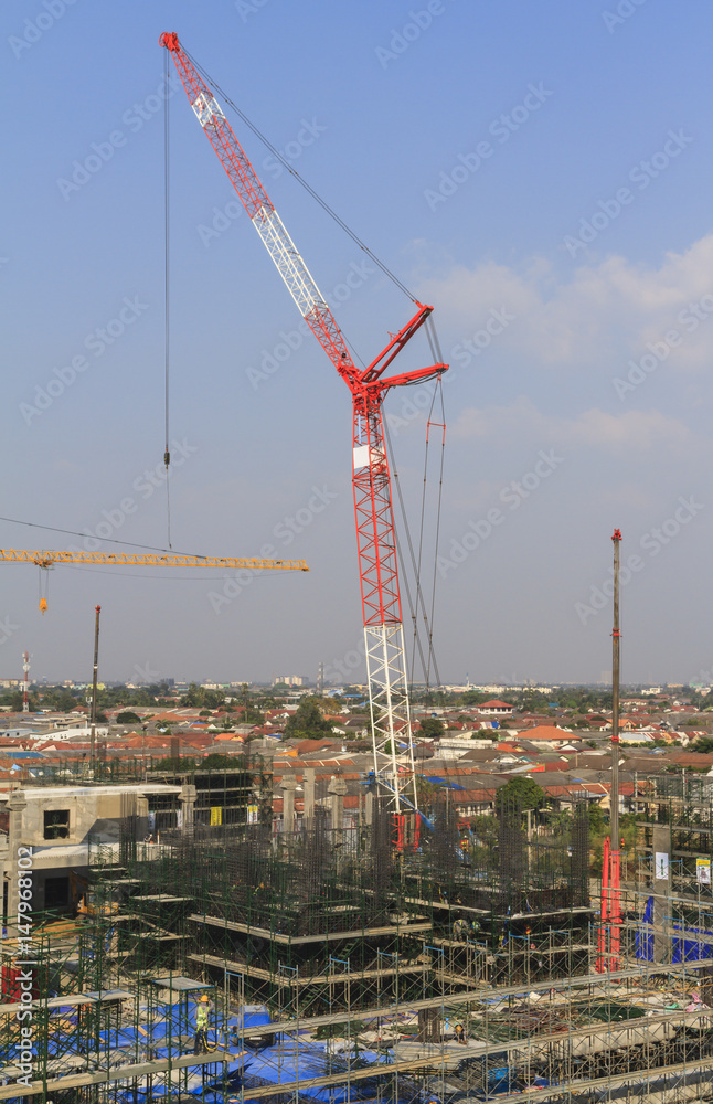 Construction site with many construction cranes.