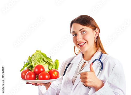 Doctor with fresh vegetables
