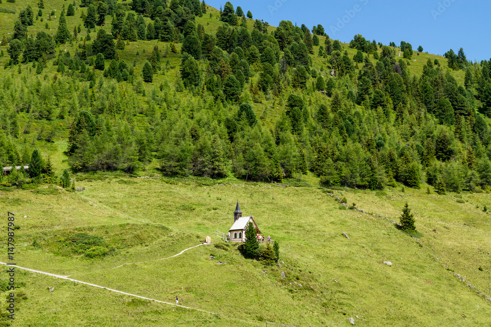 Obraz premium Idyllic mountain scenery with little church in the Alps. Austria, Zillertal High Road, Tirol