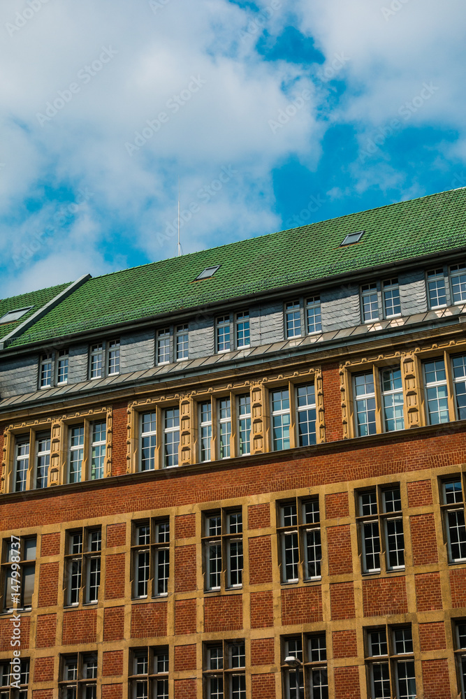 Fototapeta premium old brick facaded building in high angle format