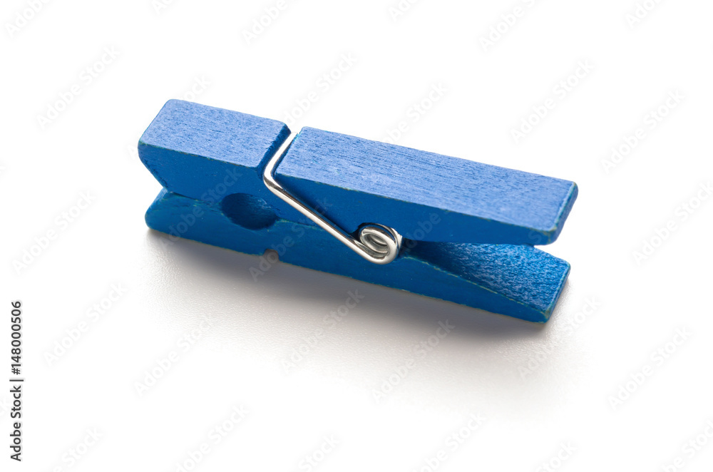 blue wooden clothespin on a white background blue wooden clothespin on a white background