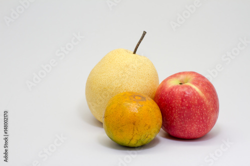 Isolated fruit picture. Honey Orange, Chinese pear and Apple