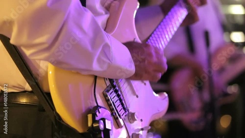 Man playing guitar on wedding party