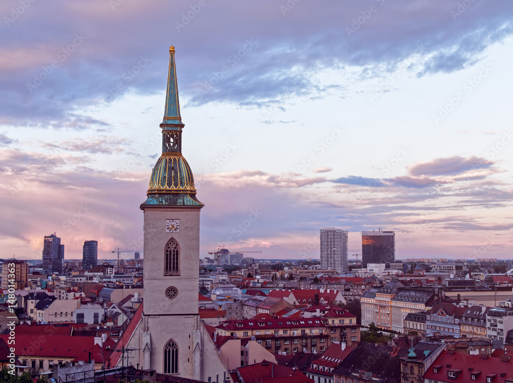Excellent view of the church of St. Martin against the background of the evening sky with clouds (Bratislava, Slovakia)