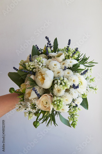 Fototapeta Naklejka Na Ścianę i Meble -  The light delicate bouquet . in green and white.Ranunculus Buttercup