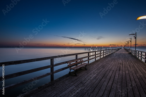 Wooden pier in Mechelinki. Small fishing village in Poland. Amazing Sunrise at the beach © R_Szatkowski