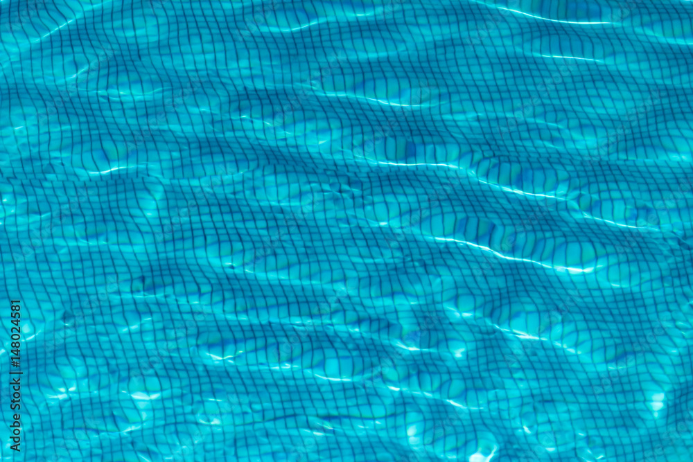 Surface of the water in the pool. Texture of the water