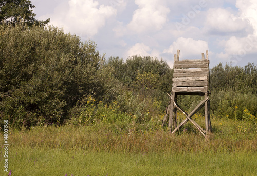 Hunting tower in the field for deer and boar game © Reddogs