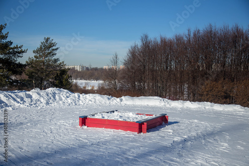 sandbox in snow