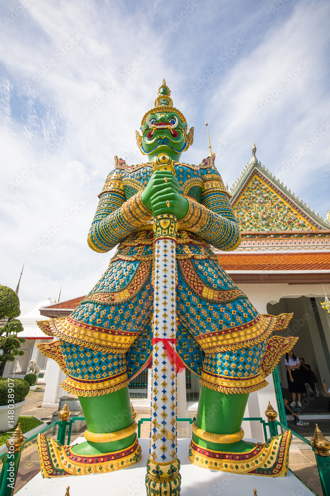 statue in Wat Arun temple in Bangkok , Thailand 