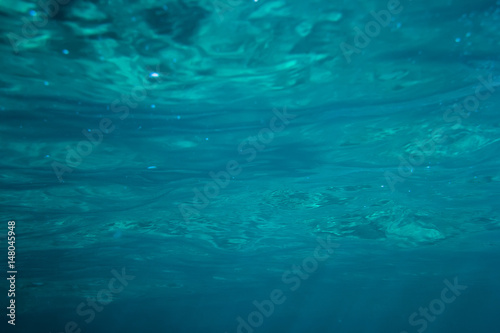 Texture of blue water in tropical ocean. Underwater in sea