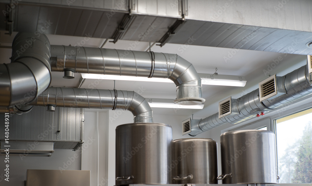 Ventilation pipe system in kitchen interior. Ventilation pipe system in kitchen interior.