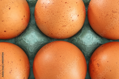 View of opened box of chicken eggs for market place photo