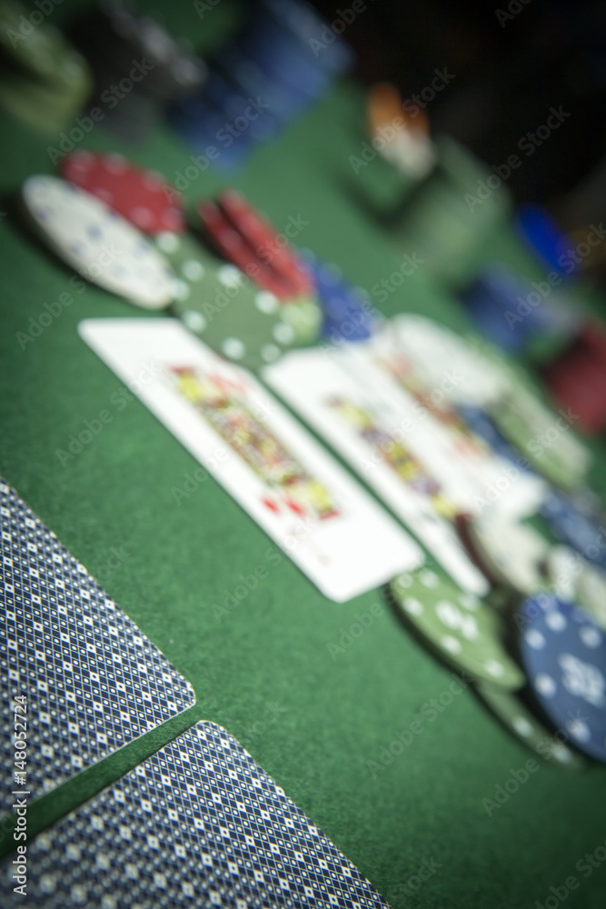 Obraz premium cards poker deck English, poker chips stack on green table