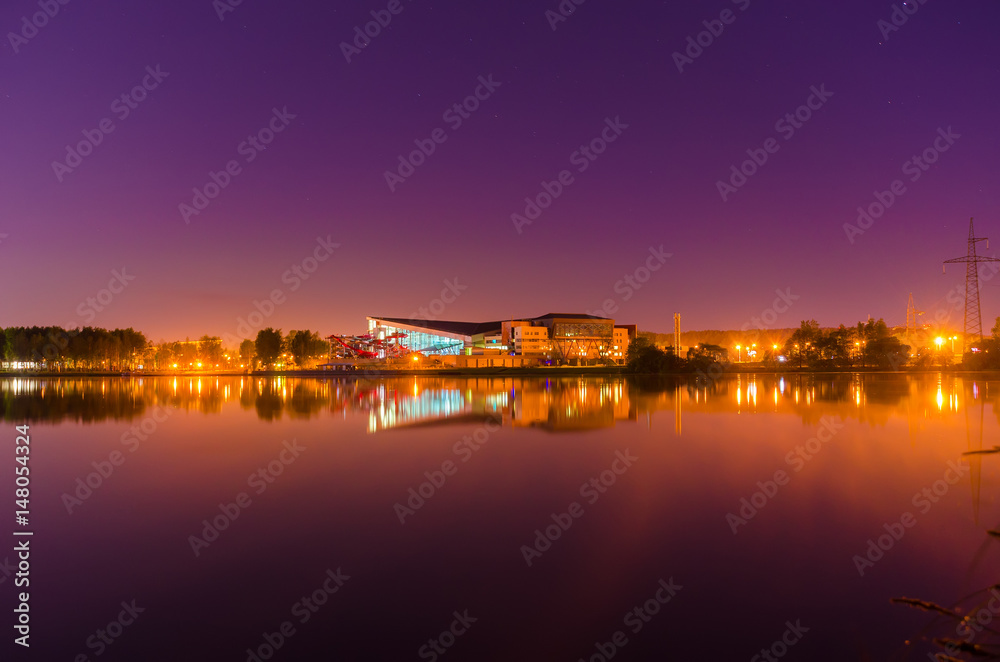 Reflection of the night city on the water surface.