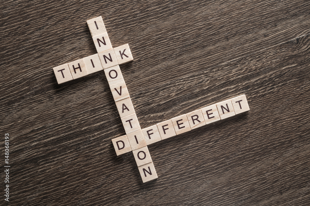 Conceptual business keywords on table with elements of game making crossword Conceptual business keywords on table with elements of game making crossword