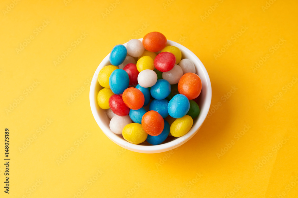 Obraz premium candy colored balls in a bowl