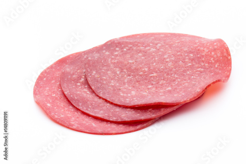 Salami smoked sausage one slice isolated on white background cutout.