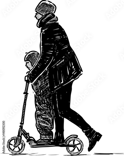 Mother with the child ride the scooter