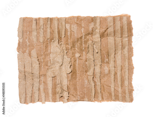 Piece of corrugated cardboard torn, isolated on white background. Cardboard texture ragged edge.