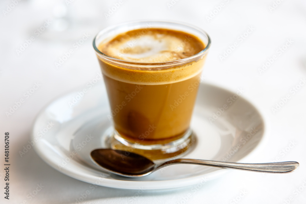 Cortado - Spanish coffee with milk in the Cup. Cortado - Spanish coffee with milk in the Cup.