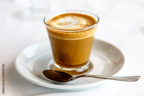 Cortado - Spanish coffee with milk in the Cup. photo