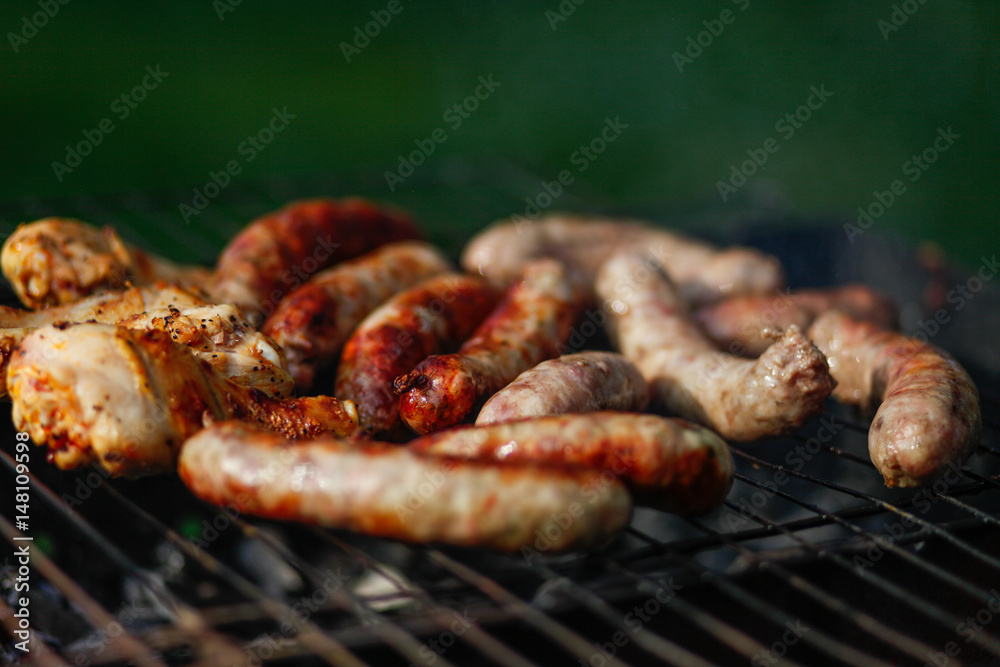 Cook out. Sausages and chicken on grill Cook out. Sausages and chicken on grill