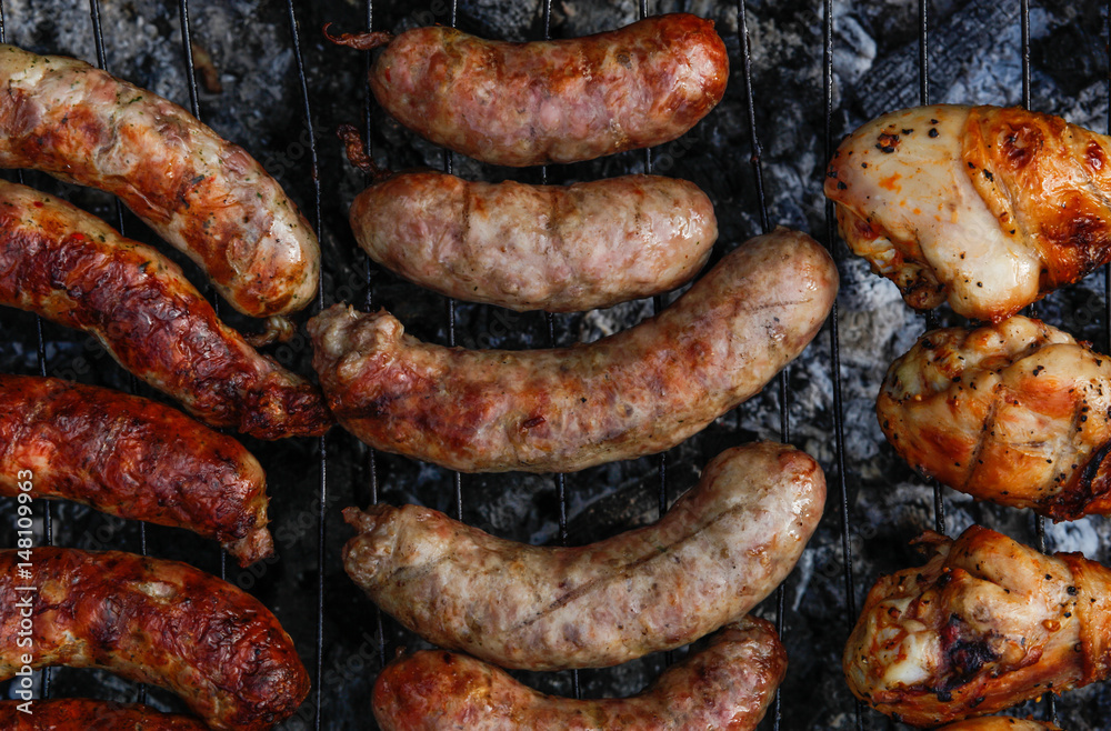 Cook out. Sausages and chicken on grill Cook out. Sausages and chicken on grill