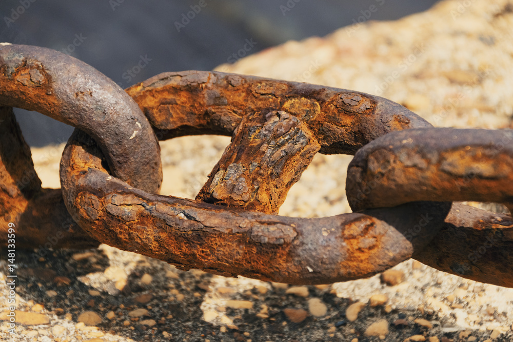 Extreme Close-Up Of Rusty Chain In Greek Port