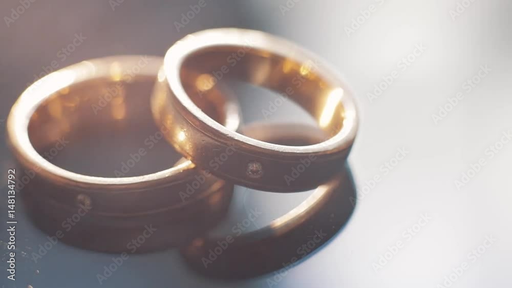 Macro shot of wedding rings sparkles in smoke Macro shot of wedding rings sparkles in smoke