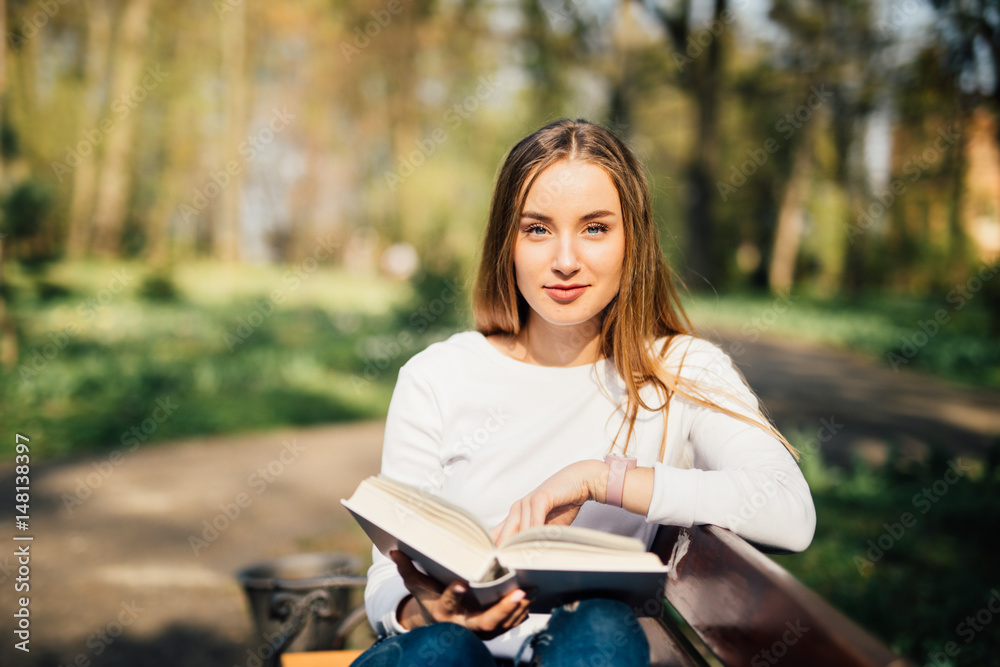 Young woman studying at the park Young woman studying at the park